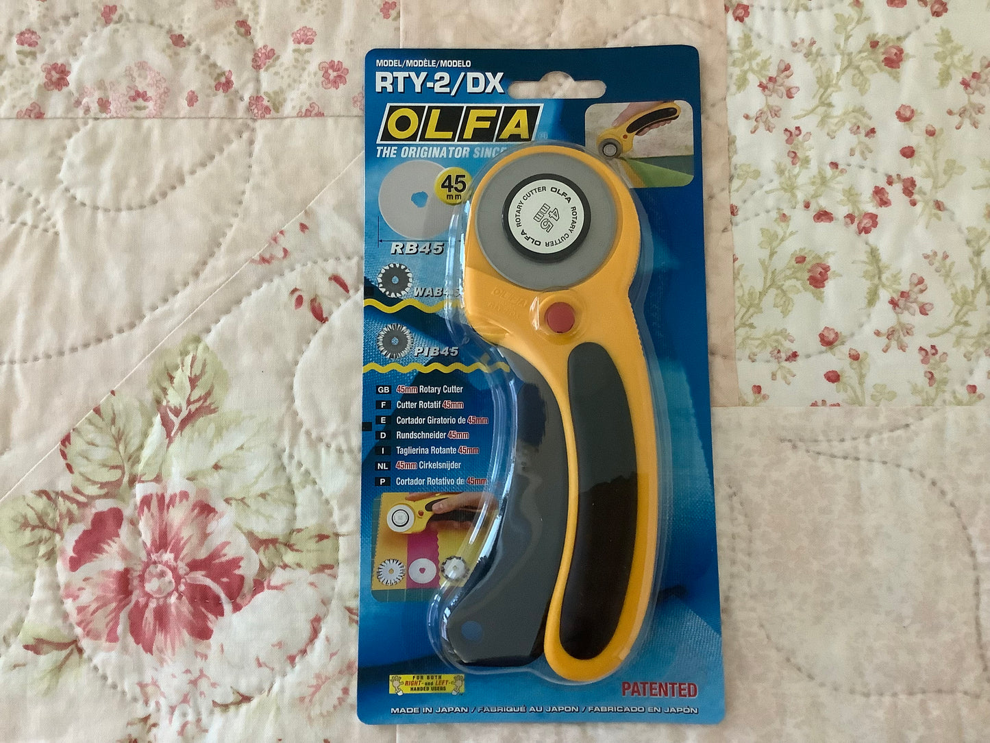 Olfa Ergonomic Rotary Cutter with safety squeeze handle - 45mm